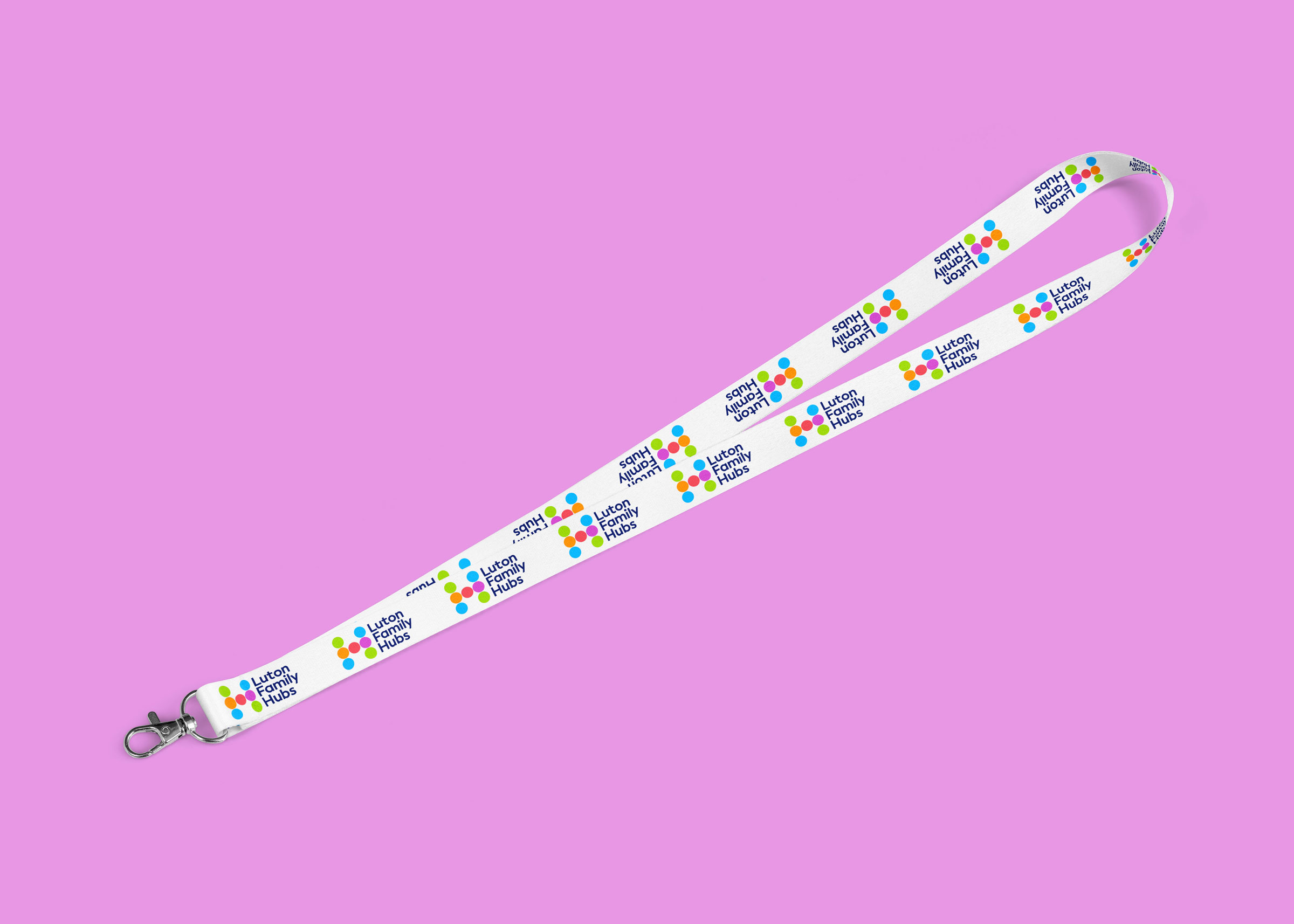 A lanyard showing the logo of Luton Family Hubs